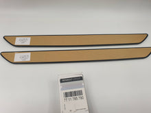Pareja de Embellecedores iluminados de Puerta Renault Clio V 2019-2025 originales 7711785790