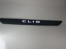 Pareja de Embellecedores iluminados de Puerta Renault Clio V 2019-2025 originales 7711785790