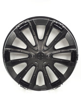 Set de 4 Tapacubos Originales de Renault Dacia de 16" Nadi bicolor negro y gris.