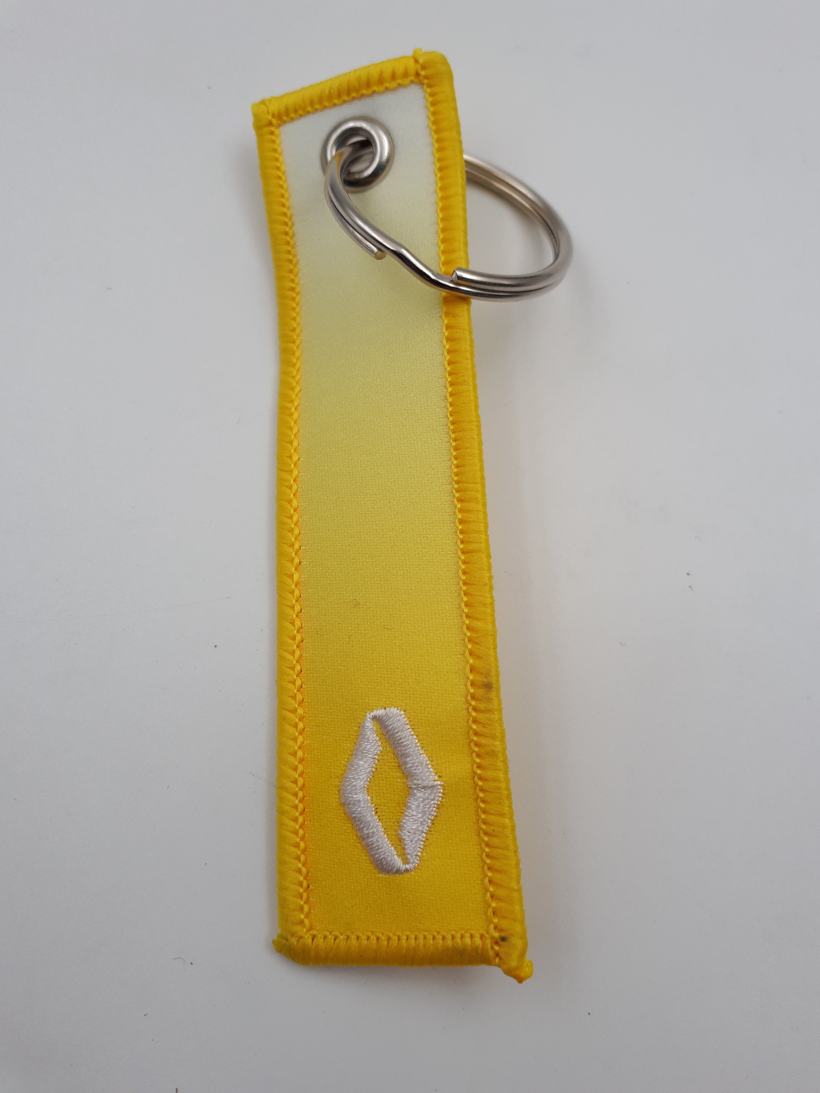 Original gelb-weißer Renault-Stoff-Schlüsselanhänger 7711944048 