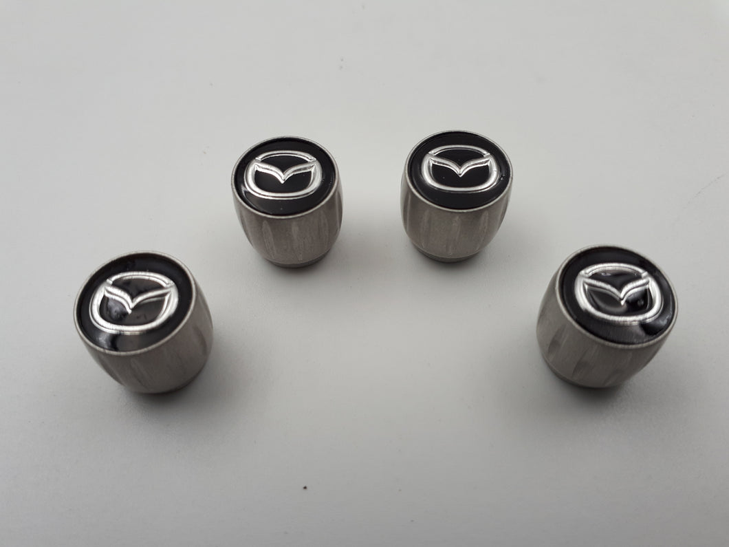 Set of 4 ORIGINAL valve caps for MAZDA C9E2-V3-820